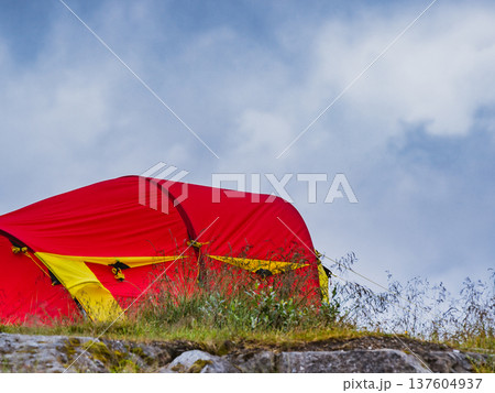 Red tent on nature. Camping 137604937