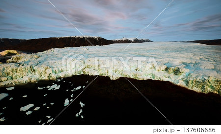 algae tinged melting sea ice showing green discoloration and fragmented floes, biological bloom hint and warming signal, textured surface and scattered melt 137606686