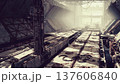 Wide derelict hangar corridor bathed in cold backlight, concrete platforms lined with rusted metal crates, overhead gantries and catwalks casting deep shadows, 137606840