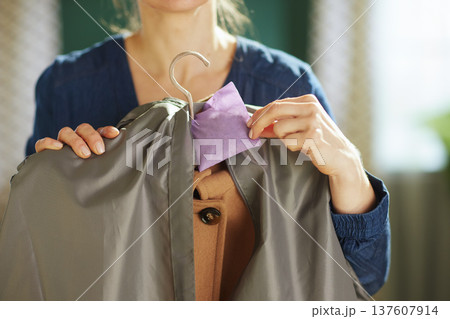 Preparing Garments for Storage with Fresh Lavender Sachet 137607914