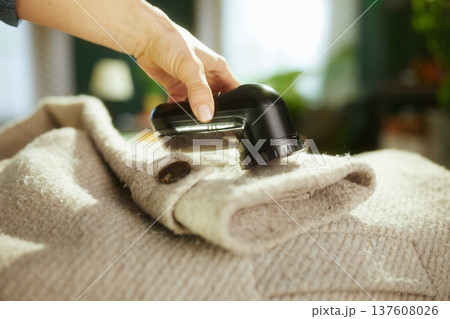 Refreshing a Beige Wool Coat for Seasonal Storage 137608026