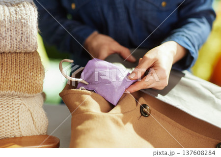 Garment Care with Lavender Sachet and Folded Sweaters Garment Care with Lavender Sachet and Folded Sweaters 137608284