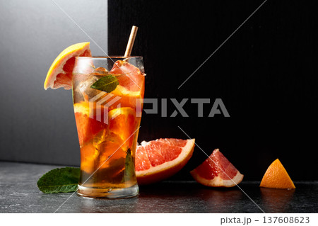 Summer refreshing drink with ice, mint, and grapefruit. Summer refreshing drink with ice, mint, and grapefruit. 137608623