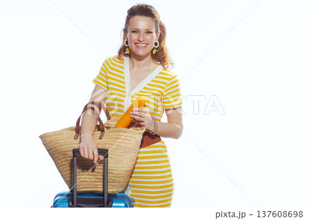 Woman with Blue Suitcase and Sunscreen for Summer Trip Woman with Blue Suitcase and Sunscreen for Summer Trip 137608698