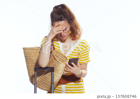 Frustrated Traveler Dealing with Flight Delay and Stress 137608746