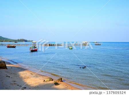 Boat at pier in sea. Landscape a traditional fishing village in Rachvem Bay Phu Quoc Island, Vietnam 137609324