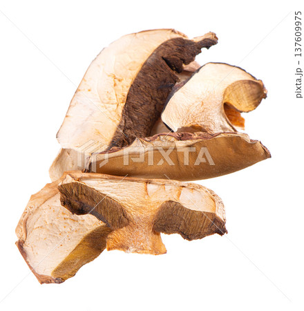 Dried porcini mushrooms isolated on white background. Clipping path. Dried porcini mushrooms isolated on white background. Clipping path. 137609975