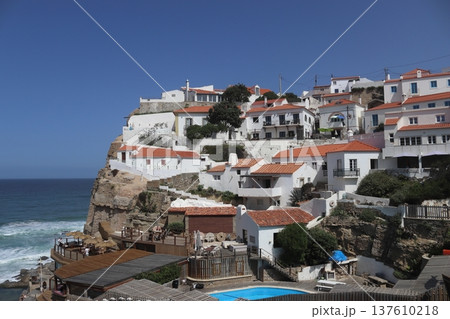Traditional white village of Azenhas do Mar perched on a cliff, Portugal. Traditional white village of Azenhas do Mar perched on a cliff, Portugal. 137610218