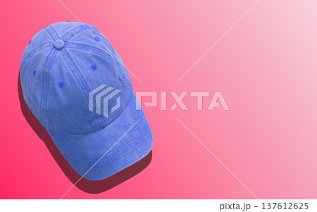 Blue jeans baseball cap, summer sun hat on pink banner background. Headwear, top view. Casual sport 137612625