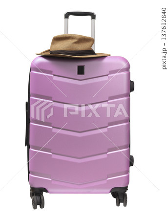 Wheeled hardshell suitcase with summer hat on top. Large polycarbonate luggage, pink travel bag for 137612840