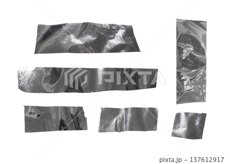 Set of metallic silver adhesive tape pieces isolated on white background. Crumpled reflective strips Set of metallic silver adhesive tape pieces isolated on white background. Crumpled reflective strips 137612917