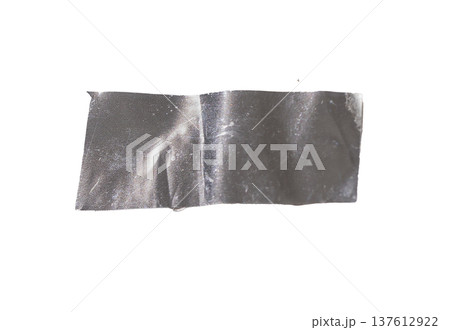 Silver adhesive tape piece isolated on white background. Reflective metallic element with crease and Silver adhesive tape piece isolated on white background. Reflective metallic element with crease and 137612922
