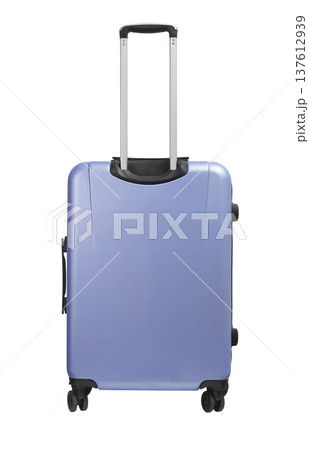Suitcase rear view. Giant blue and purple hardcase luggage with telescopic handle, side grip and 137612939