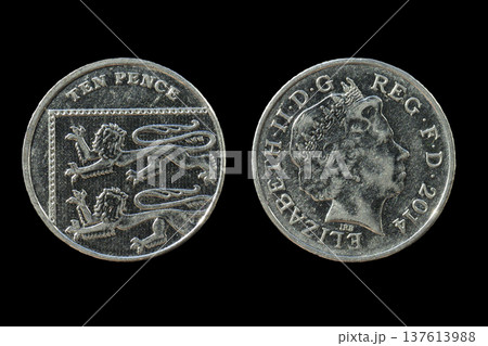 British Ten Pence Coin 2014 Elizabeth II Royal Shield Segment Obverse and Reverse Sides Isolated on Black Background British Ten Pence Coin 2014 Elizabeth II Royal Shield Segment Obverse and Reverse Sides Isolated on Black Background 137613988