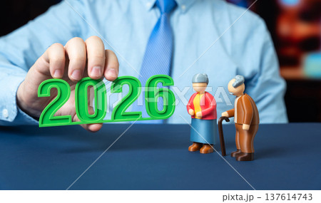 Updated pension policies, changes in retirement payments, and financial planning for seniors. 2026 year, couple of pensioners in hands of businessman Updated pension policies, changes in retirement payments, and financial planning for seniors. 2026 year, couple of pensioners in hands of businessman 137614743