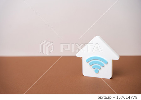 Home Wi-Fi. House internet connection. Concept for digital disruption, remote work from home. IT support, telecommunications. Modern technologies concept Home Wi-Fi. House internet connection. Concept for digital disruption, remote work from home. IT support, telecommunications. Modern technologies concept 137614779