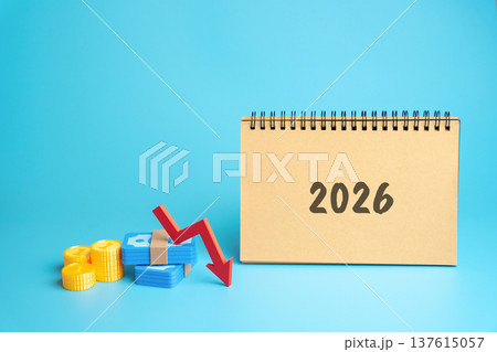 Economic crisis and recession. Bankruptcy and financial crisis. Analysis and analytics. Capital outflow. GDP. Forecasting. Notes 2026 with a downward arrow and money with coins. 137615057