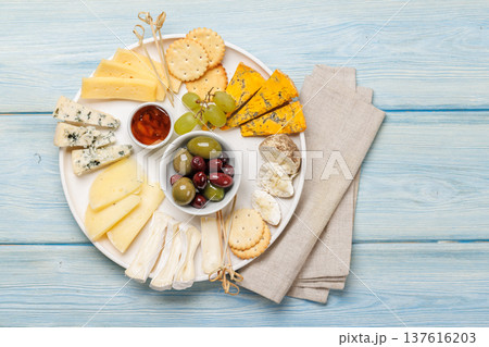 Cheese board with olives and honey Cheese board with olives and honey 137616203
