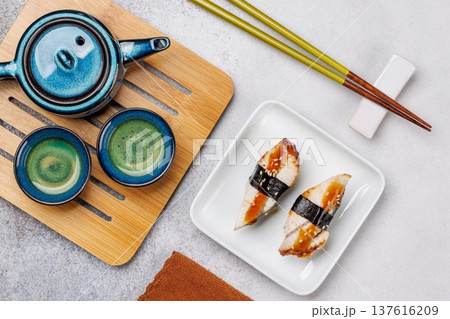 Eel sushi set with tea and teapot 137616209