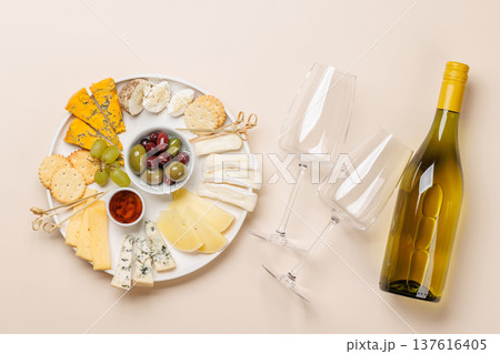 Cheese board with olives grapes and honey 137616405