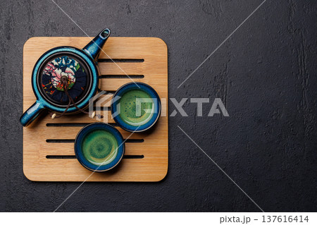 Asian tea ceremony set with teapot and cups 137616414