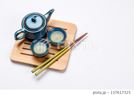 Asian tea ceremony set with teapot and cups Asian tea ceremony set with teapot and cups 137617325