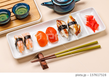 Sushi set with tea and small teapot 137617328