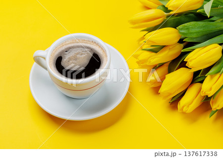 Coffee and yellow tulips 137617338