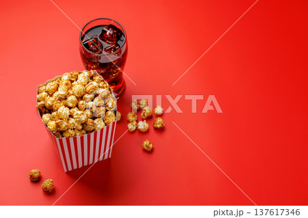 Popcorn and cola on red background 137617346