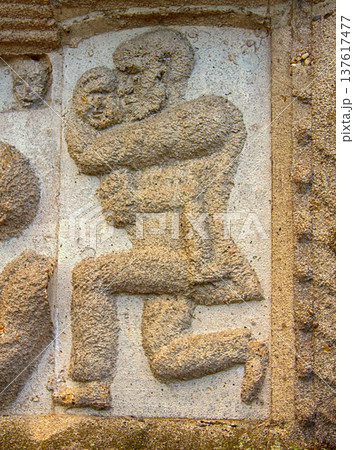 Ancient bas-reliefs on the Windows and walls of historical buildings 137617477