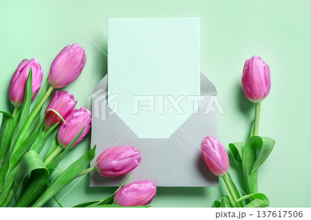 Pink tulips with blank card. Spring Floral Mockup for Greeting Cards or Invitation. 137617506