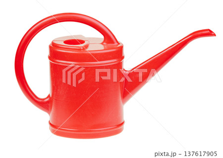 Red plastic watering can isolated on white background Red plastic watering can isolated on white background 137617905