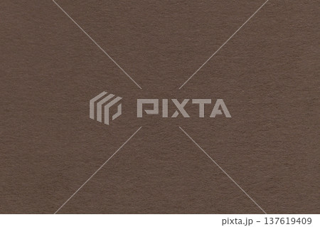 Dark brown textured paper background with subtle grain surface and soft structure. Chocolate backdrop, macro Dark brown textured paper background with subtle grain surface and soft structure. Chocolate backdrop, macro 137619409