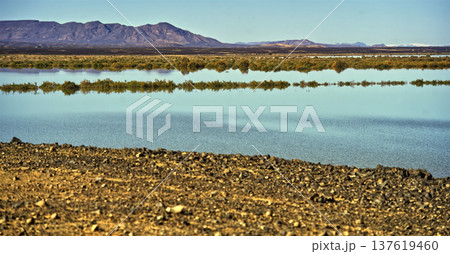 Dayet srij lake reflecting mountains and desert flora Dayet srij lake reflecting mountains and desert flora 137619460