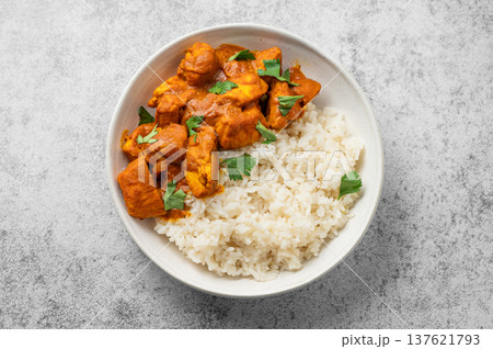 Chicken tikka masala curry with rice on concrete background 137621793