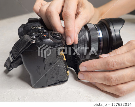 Camera repair. The grip handle's rubber is unstuck. Camera repair. The grip handle's rubber is unstuck. 137622014