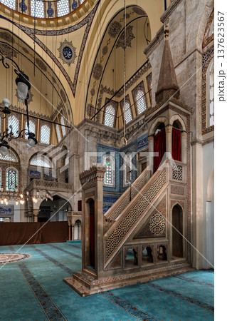 Interior of Muradiye Mosque, featuring ornate minbar, dome, intricate calligraphy, and blue carpet, Manisa, Turkey Interior of Muradiye Mosque, featuring ornate minbar, dome, intricate calligraphy, and blue carpet, Manisa, Turkey 137623567