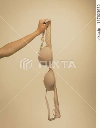 Female hand holds bra 137623650