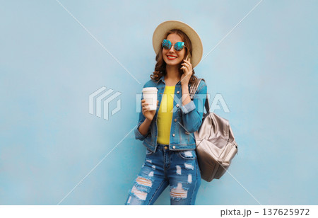 Happy modern cheerful young woman calling on phone, girl with smartphone talking 137625972