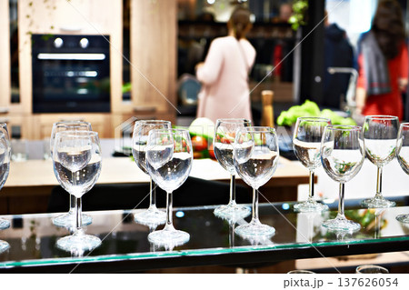 Wine glasses in kitchen store Wine glasses in kitchen store 137626054