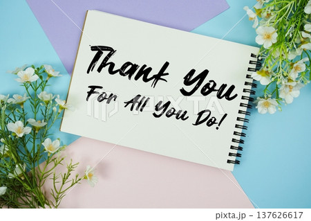 Thank You For All You Do! text written on notepad with flowers decorations flat lay on multicolor pastel background 137626617