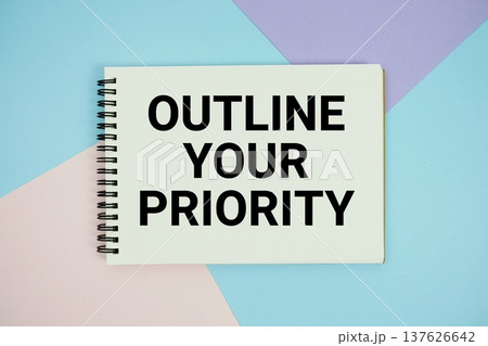 Outline Your Priority text written on notepad flat lay on multicolor pastel background Outline Your Priority text written on notepad flat lay on multicolor pastel background 137626642