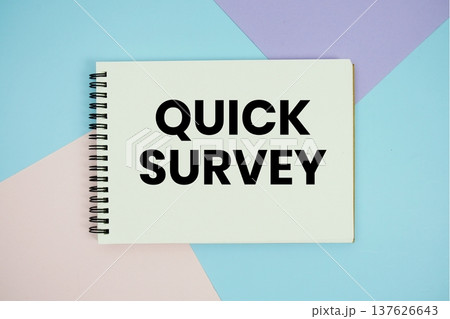 Quick Survey text written on notepad flat lay on multicolor pastel background Quick Survey text written on notepad flat lay on multicolor pastel background 137626643