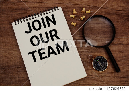 Join Our Team text written on notepad with compass and magnifying glass flat lay on wooden background Join Our Team text written on notepad with compass and magnifying glass flat lay on wooden background 137626732