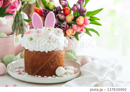 Easter Cake with Bunny Ears and Tulips. Festive Spring Composition 137630992