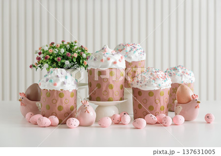 Easter Cupcakes with Eggs and Bunny Basket. Festive Spring Composition Easter Cupcakes with Eggs and Bunny Basket. Festive Spring Composition 137631005