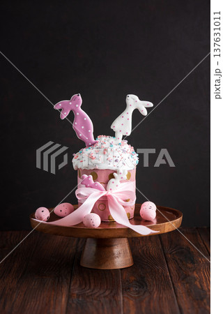 Easter cakes with Bunny Toppers and Eggs. Festive Spring Composition Easter cakes with Bunny Toppers and Eggs. Festive Spring Composition 137631011