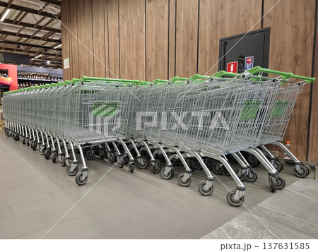 Large metal shopping carts, grocery carts or shopping trolleys 137631585