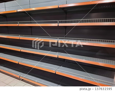 Supermarket shelves remain bare during a supply shortage Supermarket shelves remain bare during a supply shortage 137631595