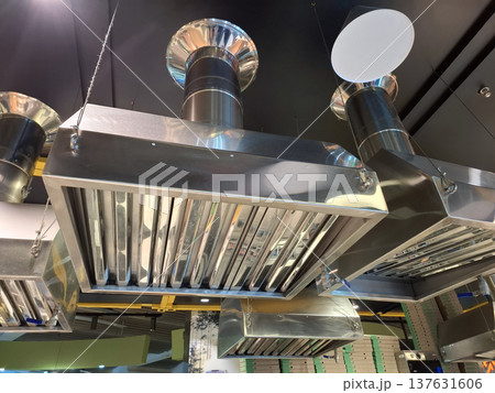 Stainless steel hoods with air ventilation at restaurant 137631606